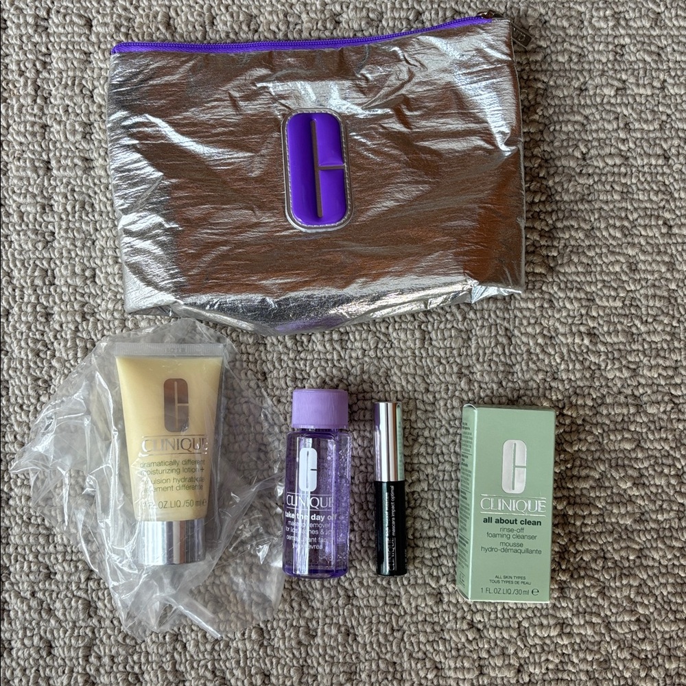Clinique - full size lotion + travel size cleanser, makeup remover mascara & bag